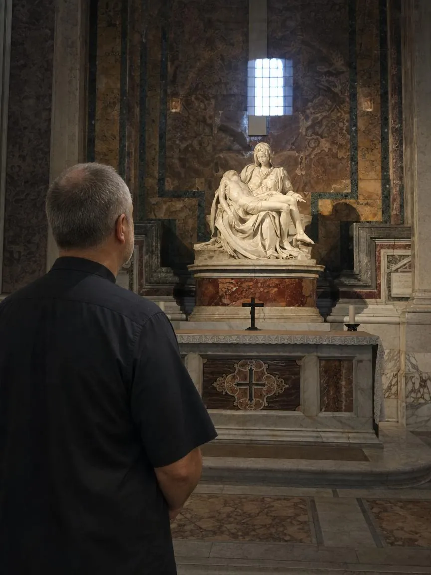 Fr. Marco standing in front of Michelangelo's Pieta behind its glass